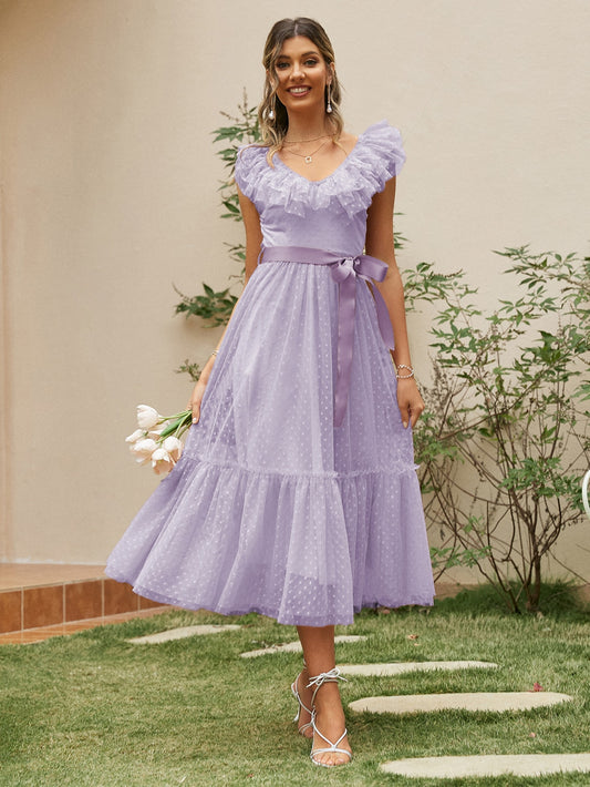 This Dreamy Dobby Mesh Dress features beautiful ruffle trim and a flattering belt, creating a romantic and elegant look. Made with high-quality dobby mesh material, it provides a comfortable and breathable fit with a touch of dreamy texture. Perfect for a special occasion or a night out, this dress adds a touch of charm to any wardrobe.