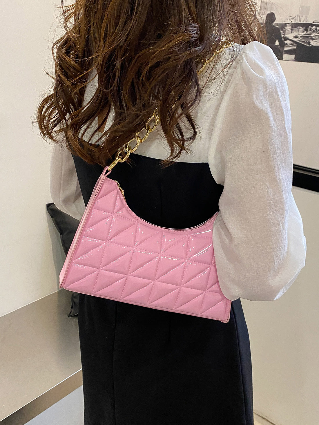 Elevate your style with our Chic Quilted Chain Bag. Its elegant design and effortless functionality make it the perfect accessory for any occasion. The sleek quilted pattern and sturdy chain strap add a touch of sophistication to your look. Enhance your wardrobe with this chic and timeless bag.