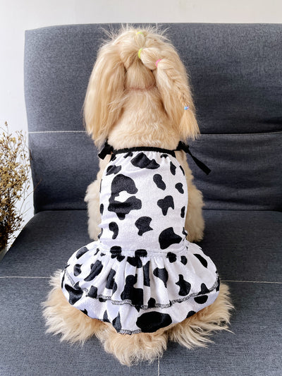 This chic cow pattern pet dress is the perfect stylish addition to your furry friend's wardrobe. Made with high-quality material, this fashion-forward dress will keep your pet comfortable and on-trend. The unique cow pattern adds a playful touch while also providing warmth and protection. Your pet will love strutting their stuff in this fashionable and functional dress.