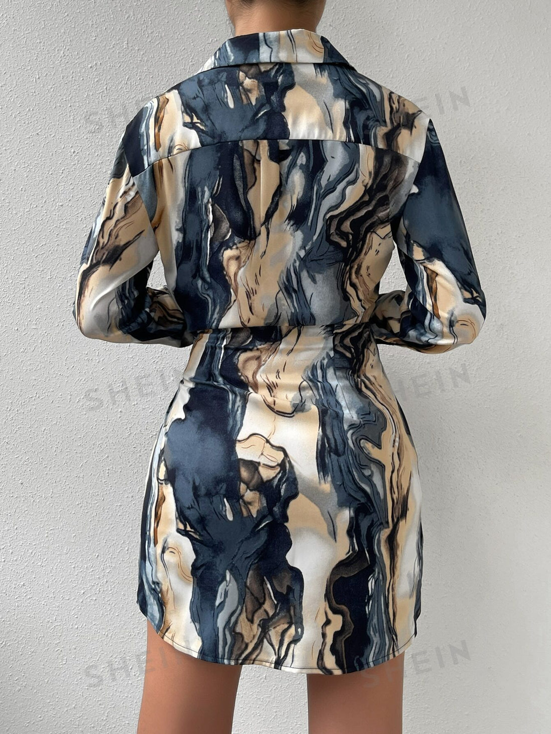 Infuse your wardrobe with Boho Chic Vibes with our Allover Print Knot Side Wrap Shirt <a href="https://canaryhouze.com/collections/women-dresses" target="_blank" rel="noopener">Dress</a>. This unique dress features a flattering wrap style with a trendy knot detail and an eye-catching allover print. Perfect for any occasion, this dress will bring a touch of bohemian elegance to your style.