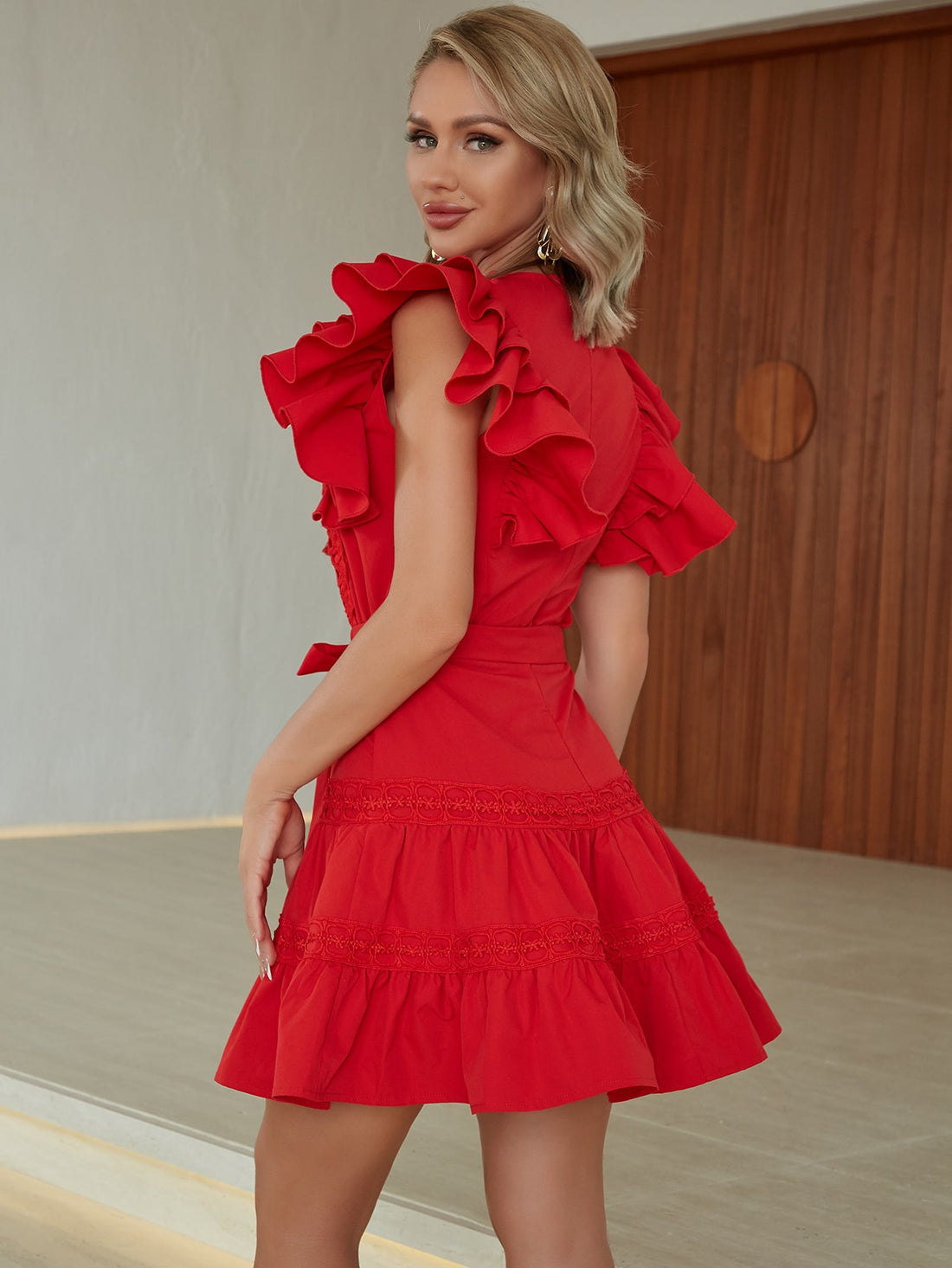 Introducing Fluttery Elegance: Guipure Lace Panel Tassel Tie Dress. Experience the delicate beauty of lace panels and the sophistication of a tassel tie. This dress exudes elegance with fluttery details and intricate guipure lace. Perfect for any occasion, elevate your style with this timeless piece.