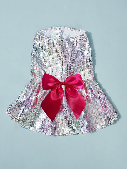 Add some sparkle and style to your pet's wardrobe with the Spice Paws Sequin Skirt. With its colorful and chic design, this skirt is sure to make a statement. Made with high-quality materials, it's both fashionable and comfortable for your furry friend. Elevate your pet's fashion game with this must-have accessory.