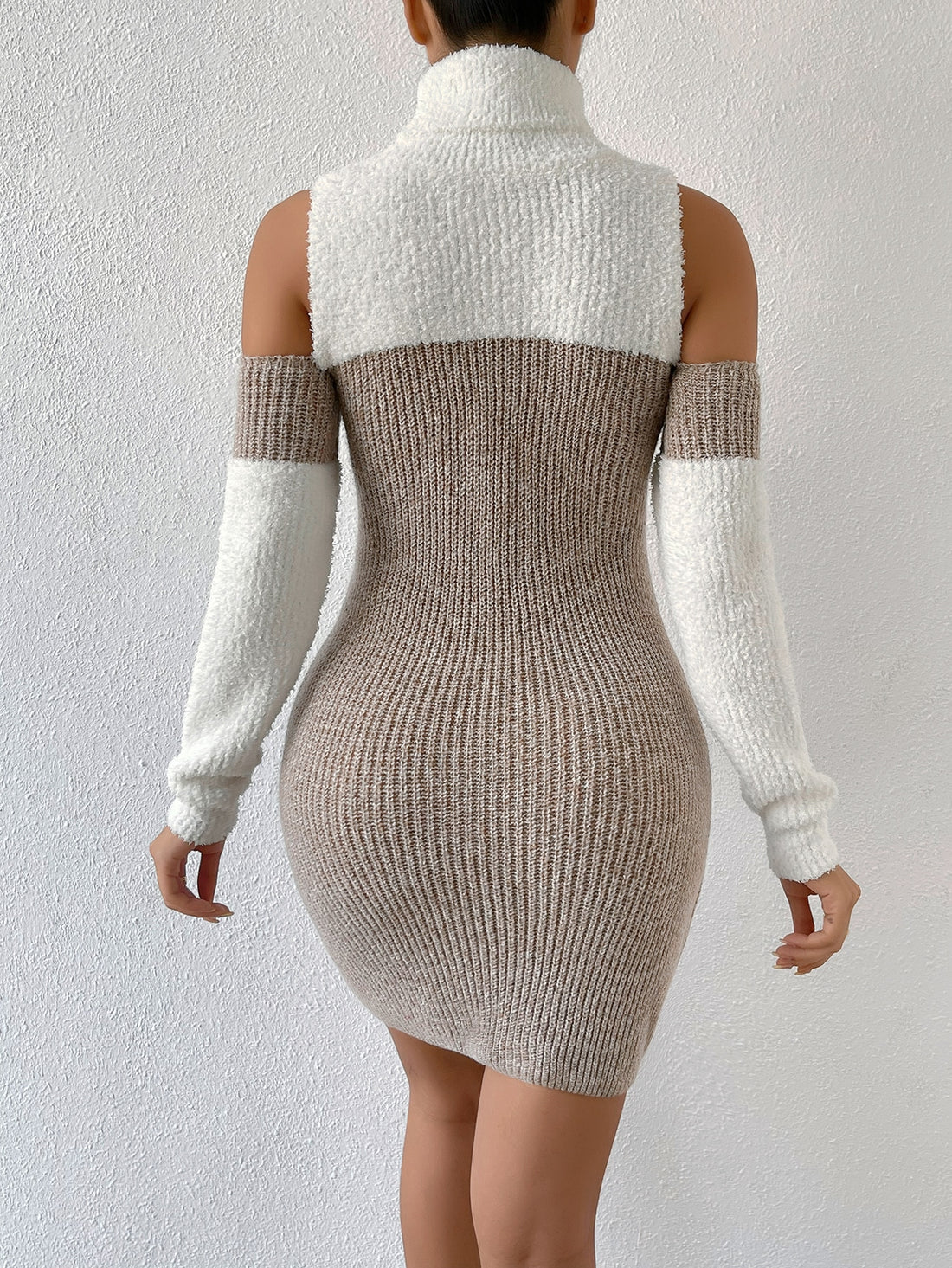 Elevate your style with our Chic Two-Tone Cut-Out Turtleneck Rib-Knit Sweater Dress. This effortlessly stylish dress features a chic two-tone design and a flattering cut-out turtleneck. Made with quality rib-knit material, it offers a comfortable and fashionable fit. Perfect for any occasion, this dress is a must-have for any fashion-forward individual.