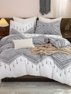 Transform your bedroom into a modern oasis with our Modern Geometric Bliss <a href="https://canaryhouze.com/collections/duvet-cover-set" target="_blank" rel="noopener">Duvet Cover Set</a>. Made of high-quality materials, this set includes 1 duvet cover and 2 pillowcases (without core), bringing a touch of geometric elegance to your bedding. Create a complete and stylish look for your bedroom with this set.