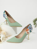 Introducing our Mint Green Floral Print Point Toe Pumps. Elevate your style with these fashionable high heel <a href=