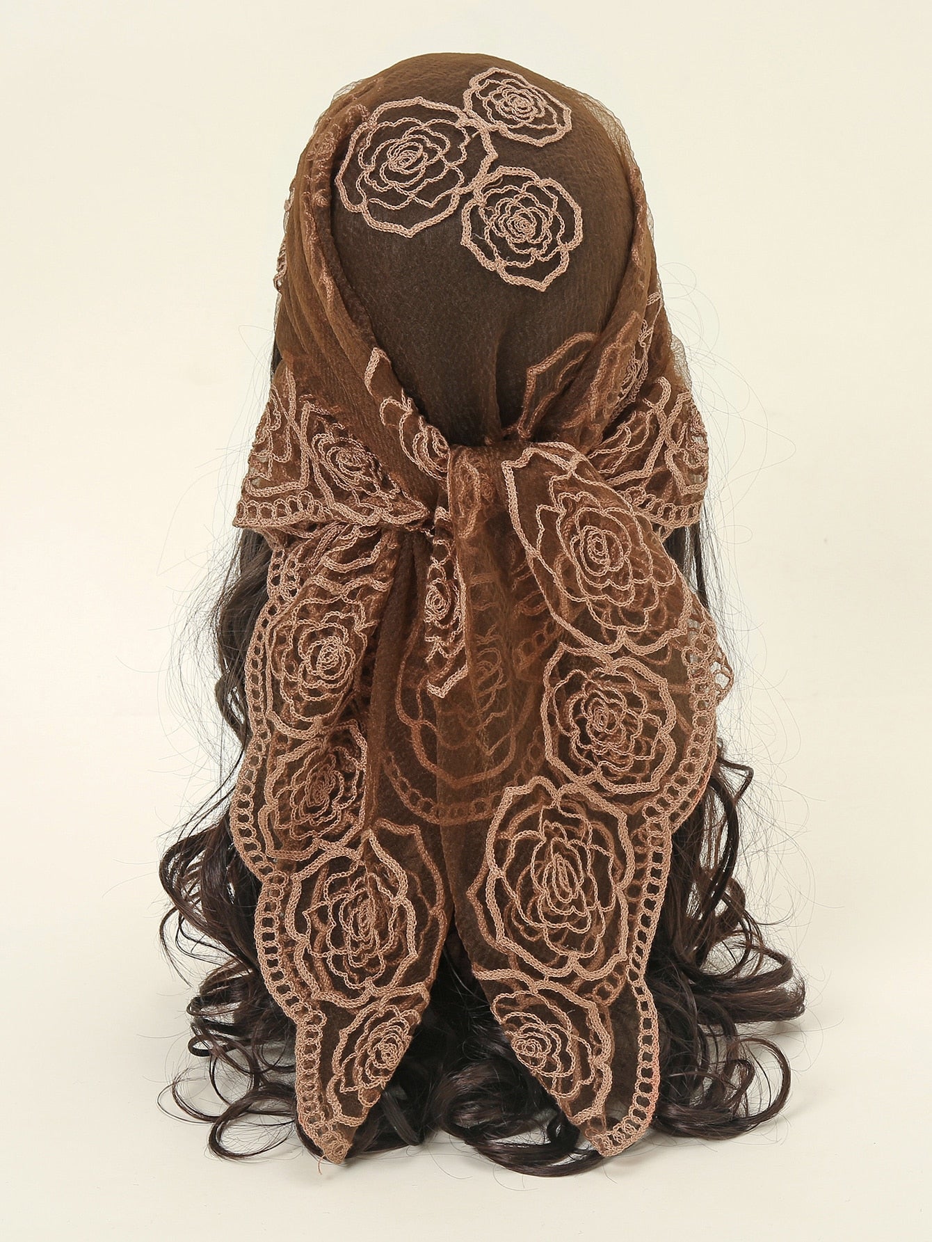 Introducing Elegance in Bloom: a beautiful, embroidered square scarf bandana for women. Made with delicate flowers, this scarf adds a touch of charm to any outfit. Light and versatile, it can be worn as a scarf or bandana, making it the perfect accessory for any occasion. Elevate your style with Elegance in Bloom.