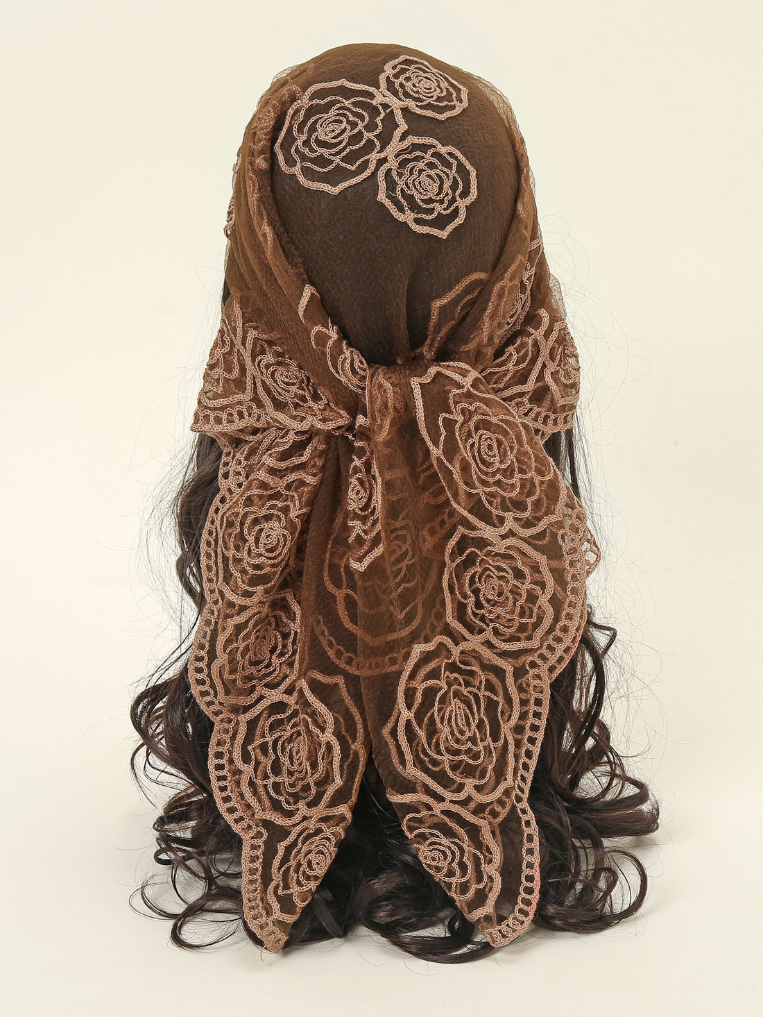 Introducing Elegance in Bloom: a beautiful, embroidered square scarf bandana for women. Made with delicate flowers, this scarf adds a touch of charm to any outfit. Light and versatile, it can be worn as a scarf or bandana, making it the perfect accessory for any occasion. Elevate your style with Elegance in Bloom.