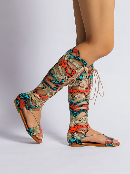 Step out in wild style with our Wild Side sandals! These chic and edgy <a href="https://canaryhouze.com/collections/women-canvas-shoes" target="_blank" rel="noopener">sandals</a> feature a snakeskin embossed design and a unique hollow-out lace-up front. Perfect for making a statement and adding a touch of daring to your wardrobe. Get ready to turn heads and unleash your inner fashionista!