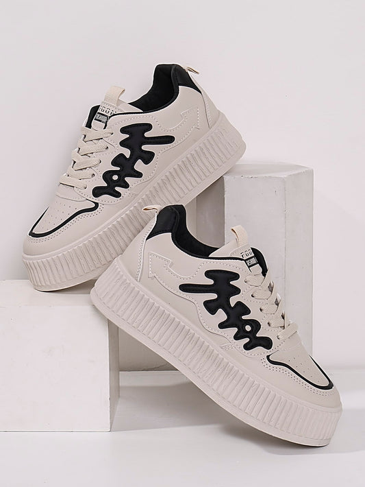 Elevate your style with Sporty Chic: Beige Letter Graphic Lace-up <a href="https://canaryhouze.com/collections/women-canvas-shoes" target="_blank" rel="noopener">Sneakers</a> for Women. Designed for comfort and fashion, these sneakers feature a unique lace-up design and eye-catching letter graphics. Perfect for any athletic or casual look, these sneakers are sure to make a statement while providing exceptional support.