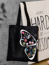 Introducing the Fluttering Blooms Shopper Tote! This essential bag features a stunning butterfly and floral print, sure to make a statement. Made with durable materials and comfortable straps, it's perfect for everyday use. Add a touch of nature and style to your wardrobe with this must-have tote.