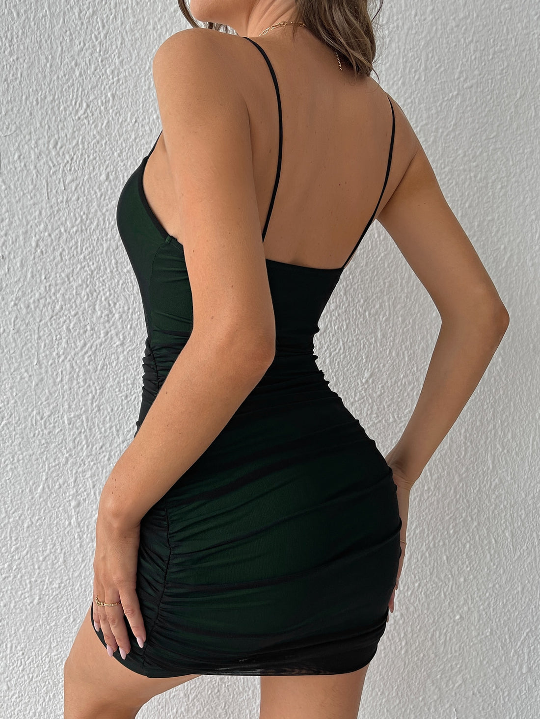 Get ready to rock your summer style with our Chic Summer Vibes dress! Featuring a trendy cutout design, playful O-ring detail, and flattering ruched front, this mesh slip dress will have you feeling cool and confident all season long. So go ahead, embrace your inner fashionista and make a statement with this must-have piece!