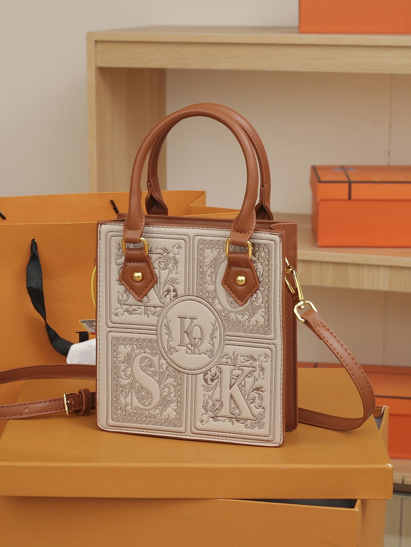 Introducing our Paper Cut Patterned Embroidery Mini Handbag, a unique and stylish addition to any outfit. The intricate paper cut pattern embroidery adds an artistic touch, while the mini size makes it perfect for carrying just the essentials. Elevate your style with this one-of-a-kind handbag.