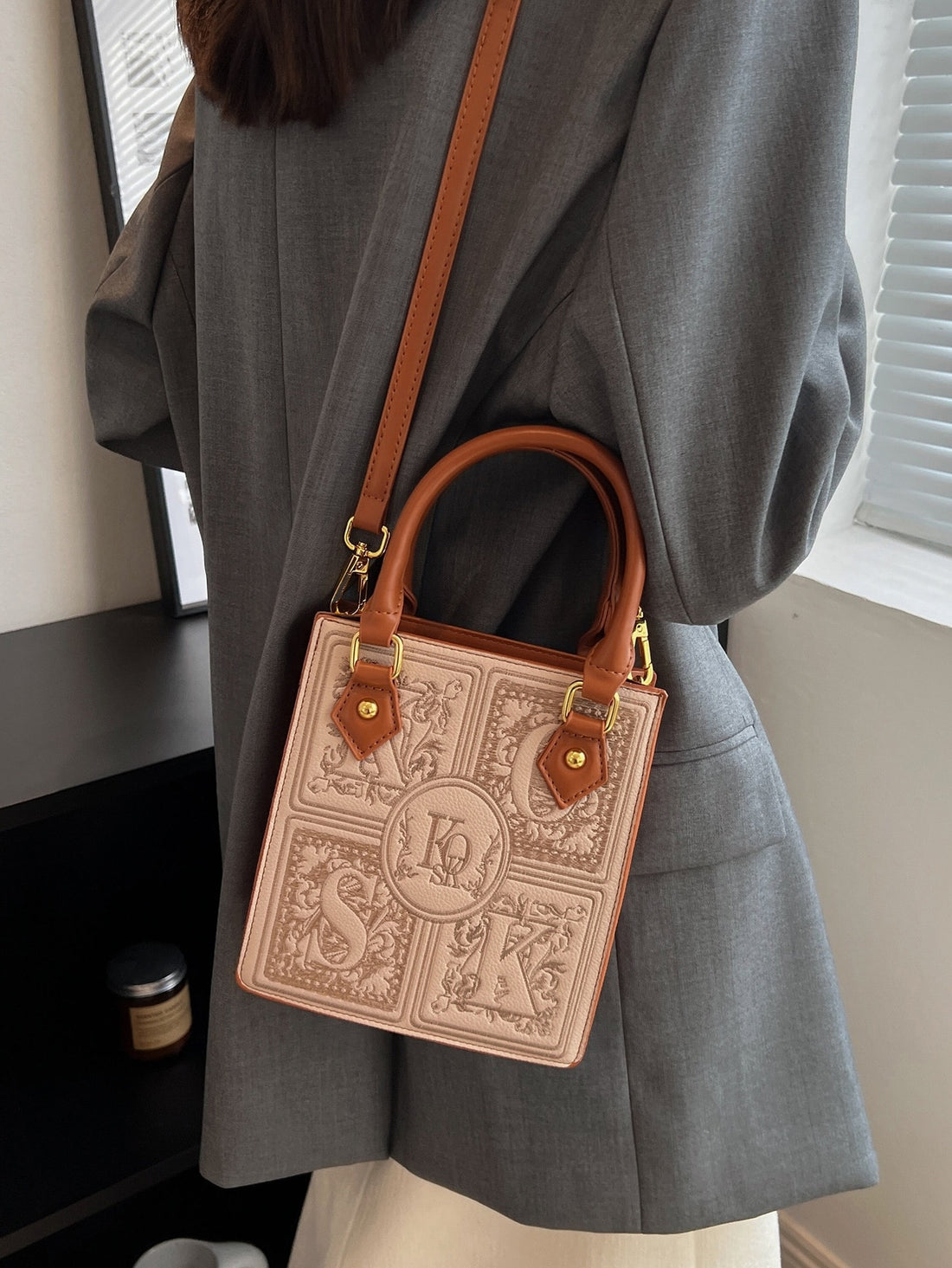 Introducing our Paper Cut Patterned Embroidery Mini Handbag, a unique and stylish addition to any outfit. The intricate paper cut pattern embroidery adds an artistic touch, while the mini size makes it perfect for carrying just the essentials. Elevate your style with this one-of-a-kind handbag.