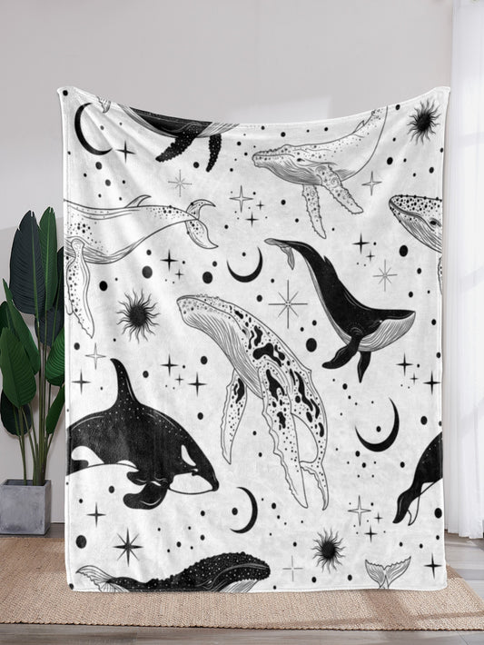 Wrap yourself in the dreamy and cozy comfort of our Magical Moon Whale Pattern Blanket. Featuring a stunning pattern of mystical moonlit whales, this blanket is perfect for snuggling up in on a chilly night. Embrace the magic and warmth of our blanket for a truly enchanting experience.