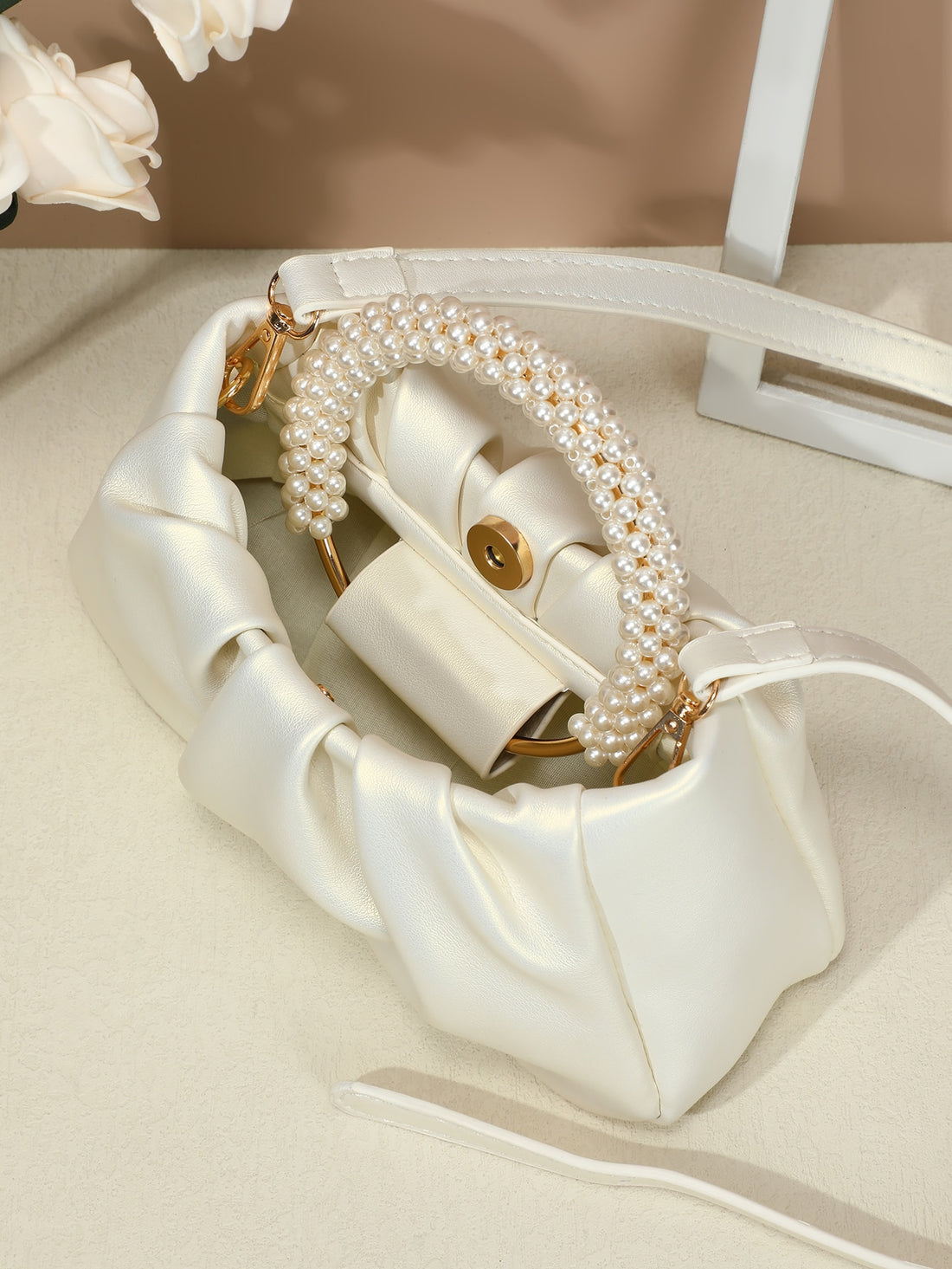 Add a touch of sparkle to your summer style with this Elegant Summer Pearl Handbag! Whether you're celebrating Mother's Day, attending a wedding, or just heading out for your daily commute, this chic accessory brings a playful yet sophisticated vibe. Its pearl accents catch the light beautifully, making every outfit pop while keeping your essentials close and organized. Perfect for those who love a little fun with their fashion!