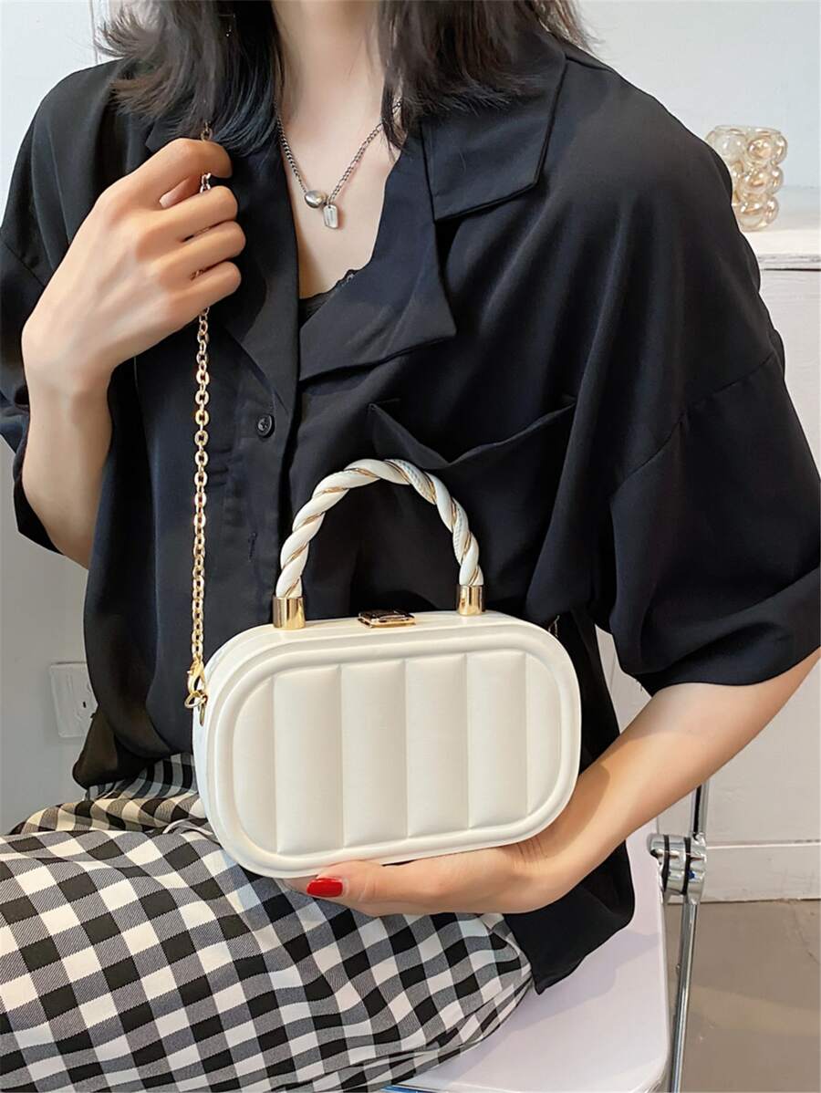 Add a pop of chic to your everyday look with this playful elliptical tote bag. Crafted from smooth PU leather, its solid color pairs perfectly with any outfit while the sturdy metal handle adds a modern edge. Spacious enough for city essentials yet stylish enough to turn heads, this tote is your new go-to companion for effortless urban cool.