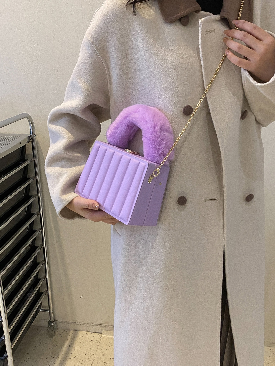 Add a pop of fun to your outfit with this stylish PU leather tote, featuring eye-catching embossed stripes that turn heads. The fluffy handle brings cozy vibes, while the mini crossbody bag is perfect for stashing essentials on the go. Whether you’re headed to brunch or a weekend adventure, this tote blends playful charm with practical style.