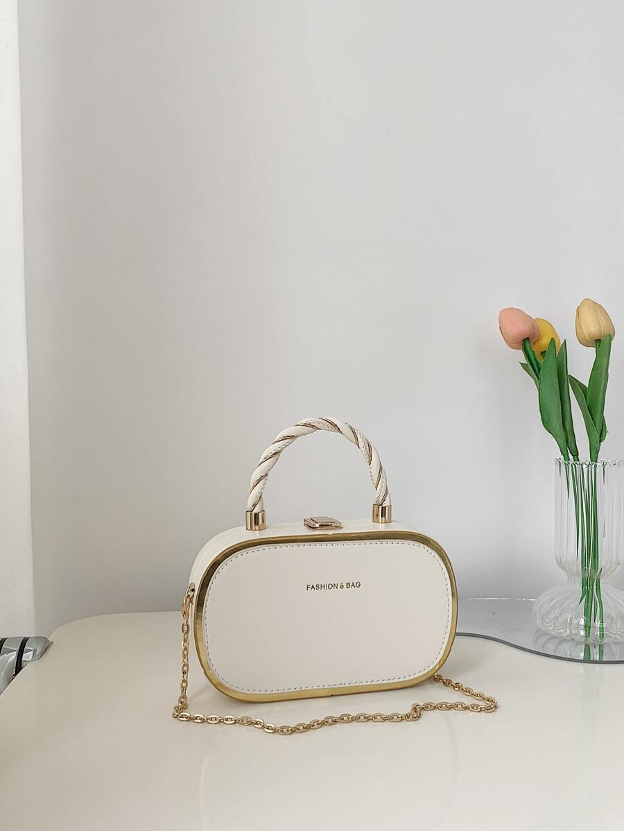 Add a pop of fun to your outfit with this playful mini handbag! Crafted from smooth PU leather, it shines with eye-catching foil print and a braided metal detail that adds just the right amount of sass. Perfectly sized for essentials, this stylish bag lets you carry your must-haves while turning heads wherever you go. Who says practical can’t be playful?