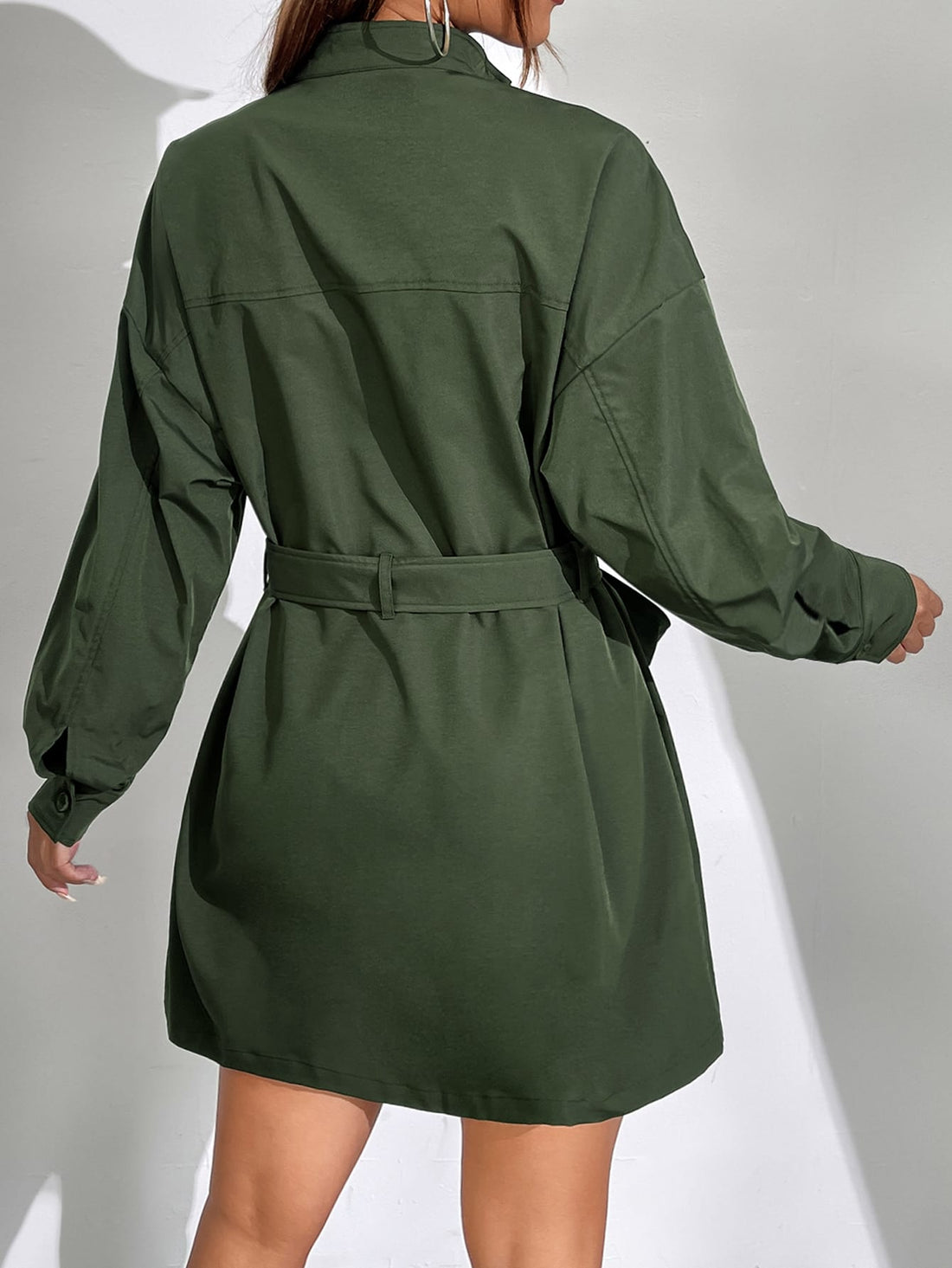 This Effortlessly Chic dress features pockets, drop shoulder design, and a belted waist for a stylish and comfortable look. The pockets provide convenience, the drop shoulder adds a trendy touch, and the belted waist accentuates your figure. Perfect for any occasion, this dress adds both fashion and functionality to your wardrobe.