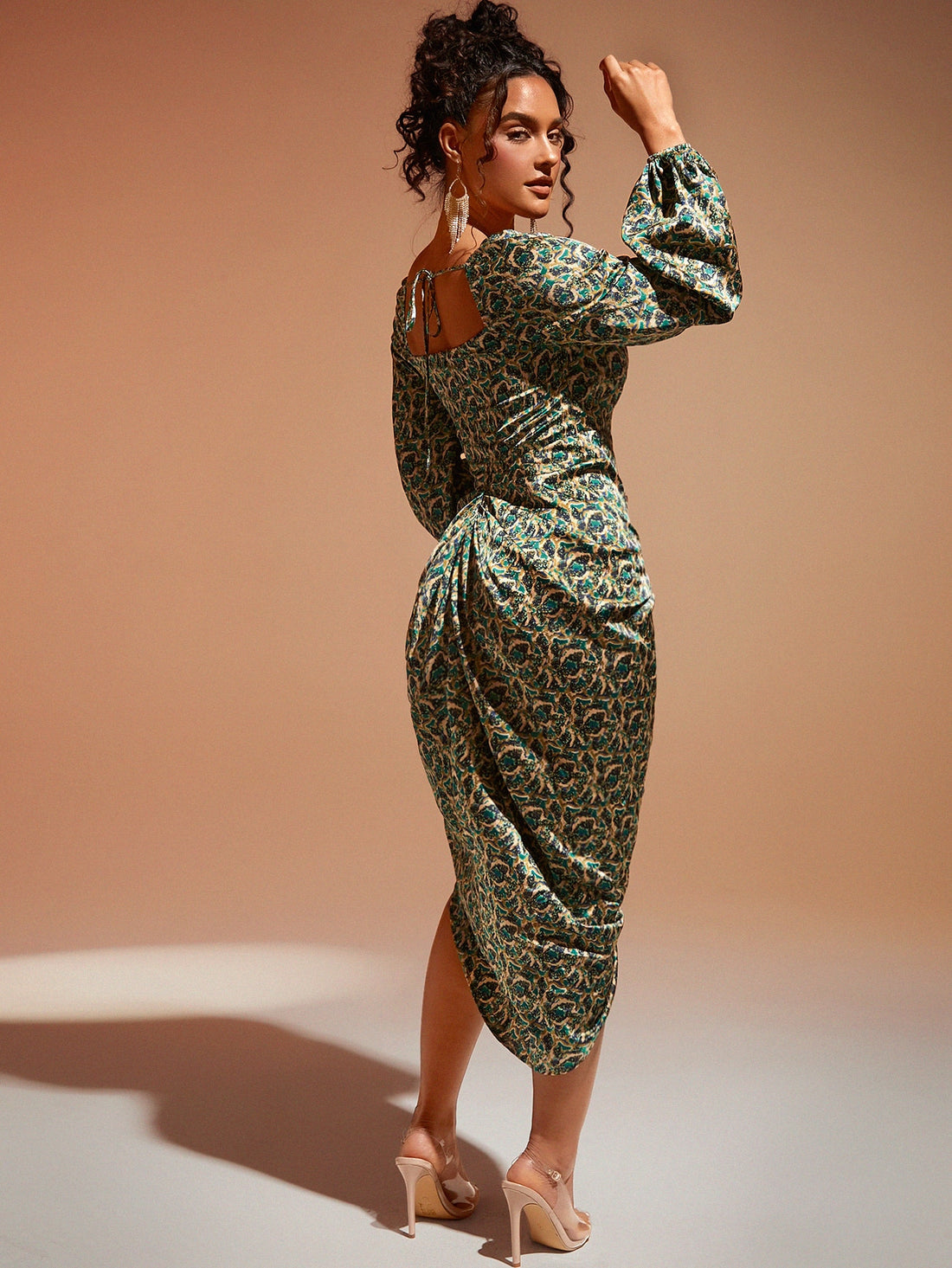 Expertly crafted with an elegant satin fabric, this dress features a stunning draped collar and ruched design. The split thigh and tie back details add a touch of allure and sophistication. Perfect for special occasions and formal events, this dress will make you look and feel effortlessly stylish.