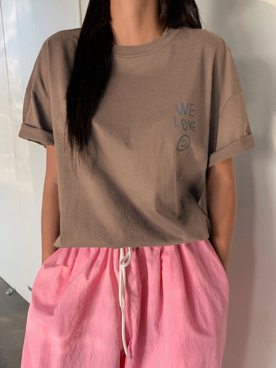 Empowerment in Print: Slogan Graphic Drop Shoulder Tee