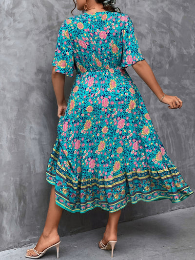 Floral Bliss Plus Size Holiday Dress: Flared Hem & Cinched Waistline