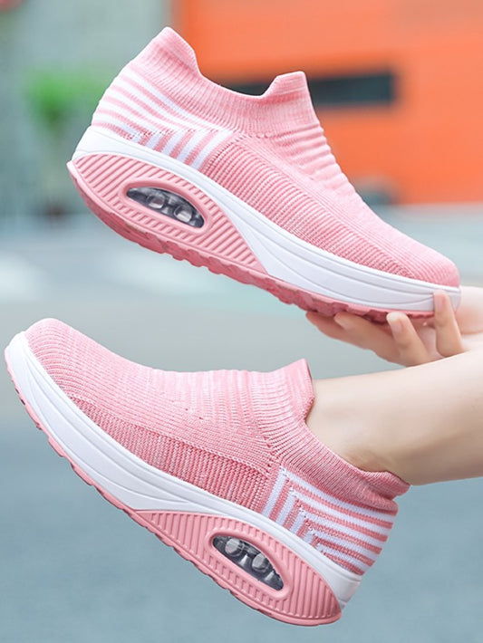 Experience style and comfort all day long with our Pink Striped Mesh Rocking <a href="https://canaryhouze.com/collections/women-canvas-shoes?sort_by=created-descending" target="_blank" rel="noopener">Shoes</a>. The breathable mesh material keeps your feet cool, while the rocking sole provides gentle support. Perfect for fashion-forward individuals looking for lasting comfort. Upgrade your shoe game now!