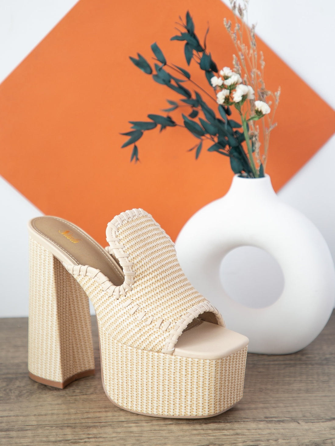 Make every step a statement with these Stylish Summer Sandals featuring a trendy braid detail and chunky heel. Perfect for vacations and weddings, these playful mules combine comfort and style, letting you dance, stroll, and celebrate with ease and flair.