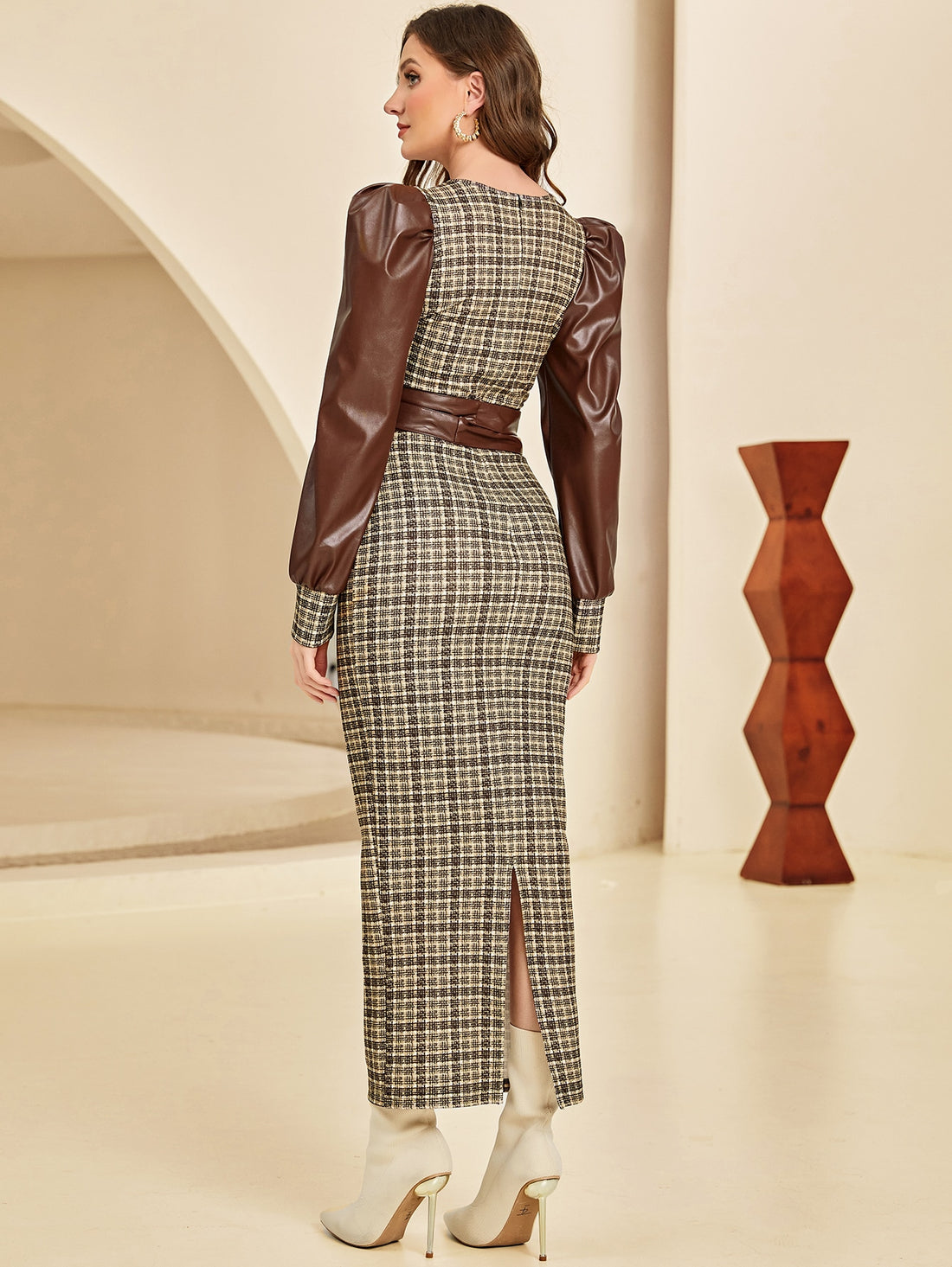 Effortlessly exude style with our Chic Plaid Print Puff Sleeve Belted Dress. The dress features a flattering belted waist and trendy puff sleeves, making it the perfect addition to your wardrobe. Its stylish plaid print adds a touch of sophistication to any look. Elevate your fashion game with this versatile and stylish dress.