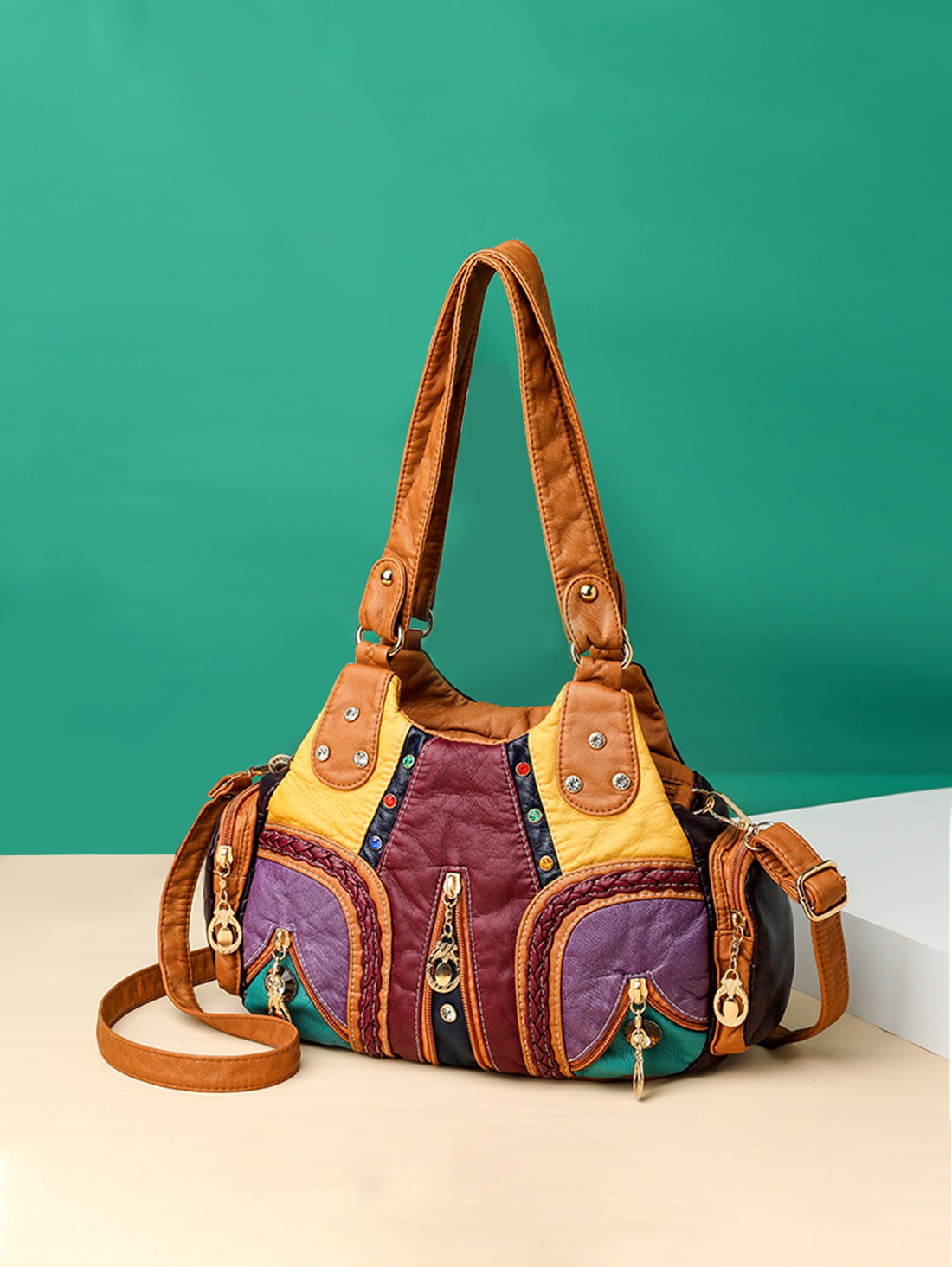 Elevate your style with our Color Block Chic Tote Bag. Its Half Moon design and colored rivets add a touch of sophistication to your outfit. With its spacious interior, you can easily carry all your essentials. Made of high-quality materials, it's both fashionable and functional.