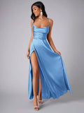 Posed front view of light blue slit maxi dress with flowing skirt