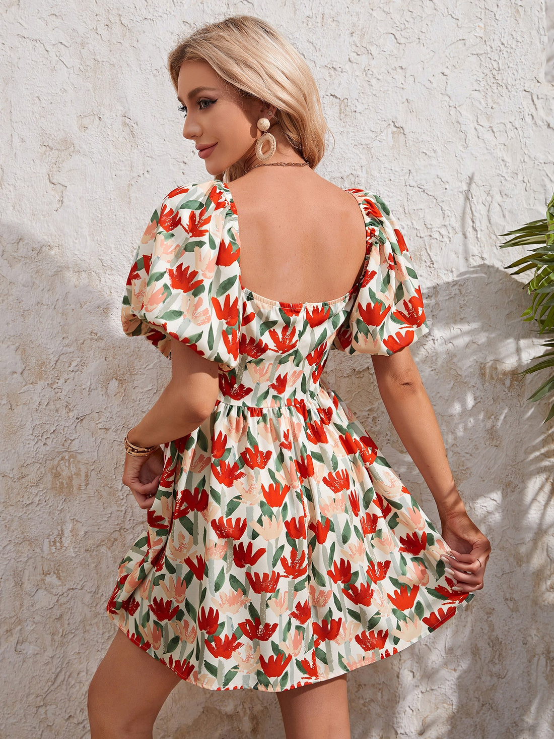Embrace carefree charm with this Boho Floral Puff Sleeve Dress, perfect for sunny vacations and lively summer festivals. Its playful puff sleeves and vibrant floral pattern bring a whimsical touch, while the breezy fabric keeps you cool and comfortable all day long. Dance, explore, and soak up the sun in effortless style!