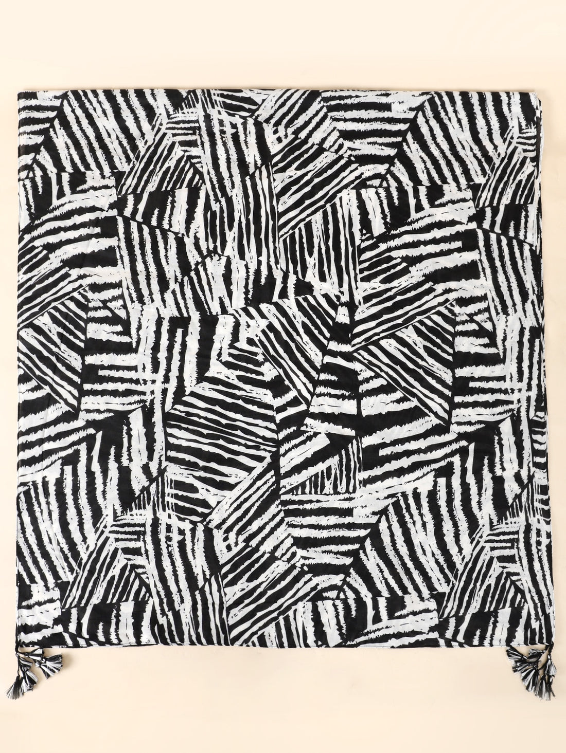 Add a touch of wild and stylish flair to your wardrobe with our Zebra Striped Print Tassel Decor Scarf. The unique print and tassel accents make this scarf a bold and fashionable statement piece. Made with high-quality materials, it's perfect for any occasion.