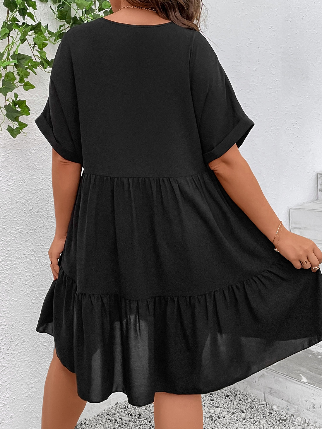 Elevate your style and comfort with our Chic & Comfortable Plus Size Batwing Sleeve Ruffle Hem Smock Dress. Embrace your curves in this trendy and playful dress, perfect for any occasion. The batwing sleeves and ruffle hem add a touch of fun and flair to your wardrobe. (Size inclusive and stylish. Plus size never looked so good!)