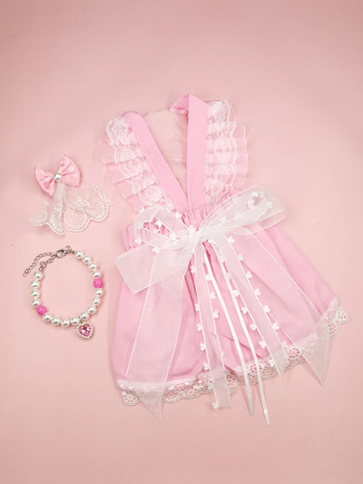 Enhance your pet's style with our Chic Bow Pet Ensemble! This set includes a dress, necklace, and hair clip for a complete look. With its elegant design, your furry friend will surely stand out in any occasion. Made with quality materials for comfort and durability. Add a touch of glamour to your pet's wardrobe today!