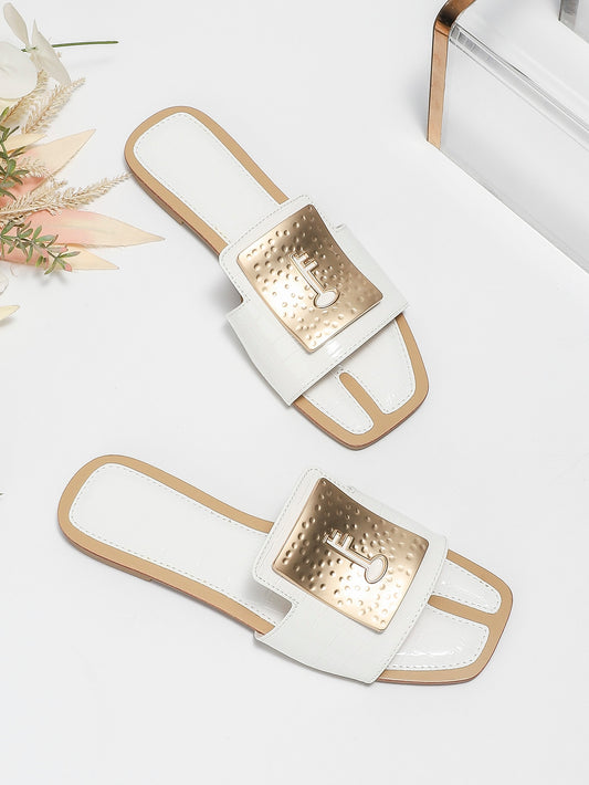 Upgrade your outdoor style with Chic Metal Detail Slide <a href="https://canaryhouze.com/collections/women-canvas-shoes" target="_blank" rel="noopener">Sandals</a>. These must-have flats are perfect for any outdoor adventure with their durable design and sleek metal detailing. Enhance your comfort and fashion with these stylish sandals.