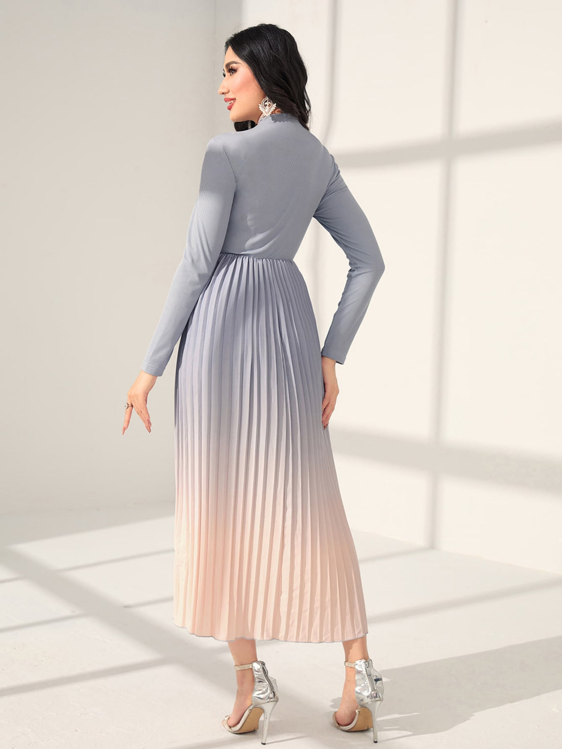 Elevate your wardrobe with our Ombre Pleated Hem Dress. Featuring a chic gradient design, this dress exudes elegance for any occasion. The pleated hem adds a touch of sophistication, while the ombre effect adds depth to your look. Elevate any event with this stylish and versatile dress.