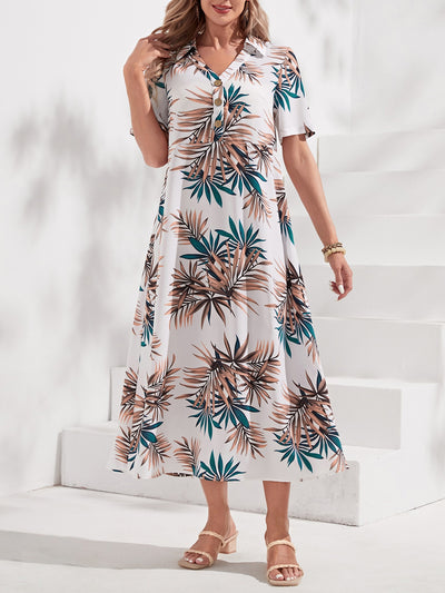 Experience the ultimate tropical paradise with our Paradise Dreaming dress. The button front design adds a touch of sophistication, while the tropical print transports you to a relaxing vacation destination. Made with high-quality materials, this dress is perfect for any occasion or escape to paradise.