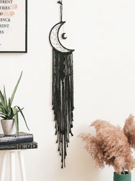 Create an ethereal and stylish atmosphere in your home with our Dreamy Boho Moon Tassel Wall Hanging. This unique home decor piece features a beautiful moon design with tassel accents, bringing a touch of bohemian charm to any room. Add a dreamy and whimsical vibe to your living space with this must-have piece.