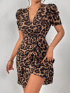 Add a touch of fierce elegance to your wardrobe with our Wild Elegance Leopard Print Puff Sleeve <a href="https://canaryhouze.com/collections/women-dresses" target="_blank" rel="noopener">Dress</a>. Featuring a trendy leopard print and stylish puff sleeves, this dress is sure to make a statement. Made with high-quality materials, it offers both comfort and style for any occasion.