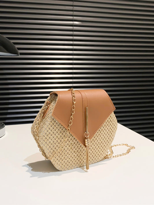 Introducing the must-have handbag for summer, the Boho Chic Mini Tassel Flap Straw Bag. With its chic bohemian design and mini size, this bag is perfect for carrying all your essentials while still making a statement. The tassel flap and straw material add a touch of style, making it a must-have for any summer outfit.