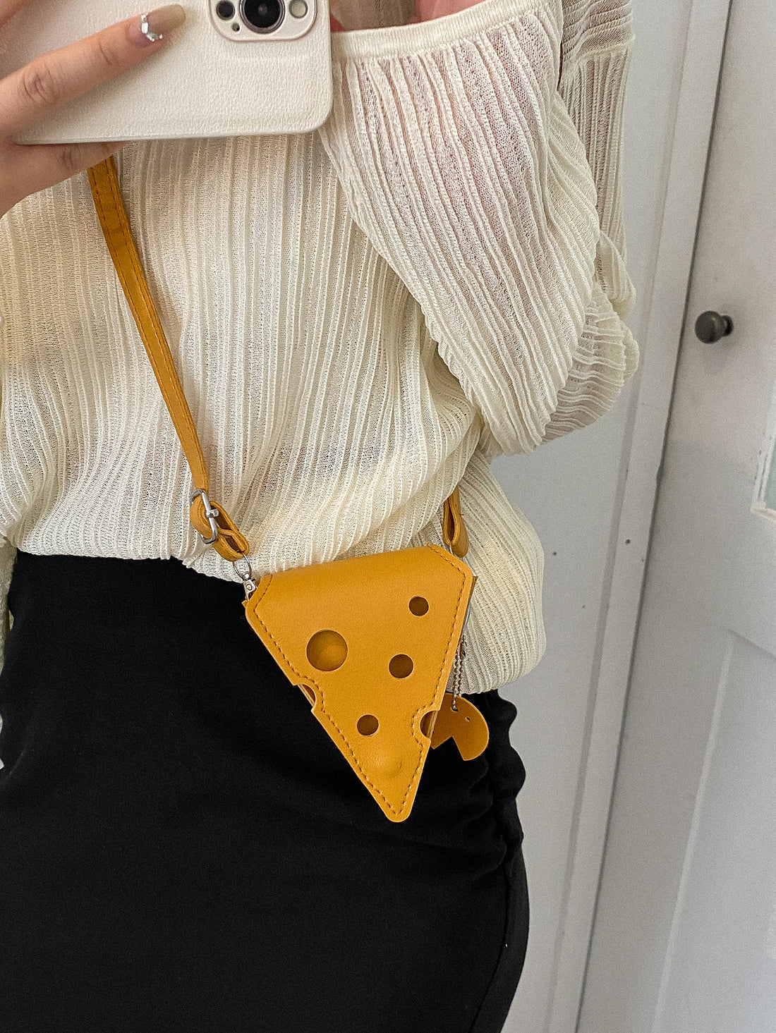 This Whimsical Mini Cheese Novelty Bag is the perfect gift for any cheese lover. With its unique design and playful character, it's sure to bring a smile. Made from high-quality materials, it's durable and practical. Get ready to add a touch of whimsy to your cheese-loving friend's life!