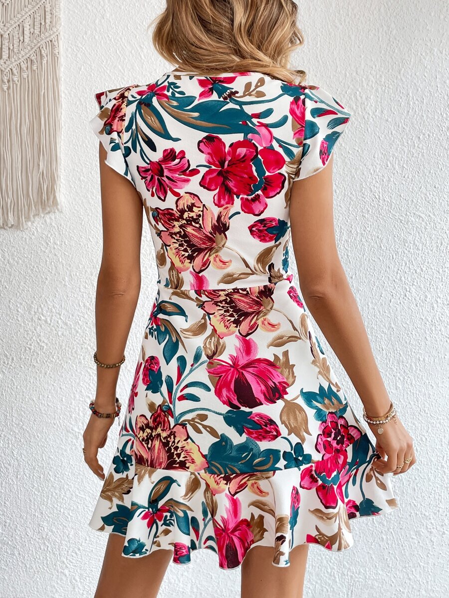 Step into sunshine with this chic V-neck summer dress, designed for stylish women who love a playful twist. The cap sleeves and flirty ruffle hem add a breezy, fun vibe, making it your go-to outfit for vacations or sunny days out. Lightweight and effortlessly feminine, it keeps you cool while turning heads wherever you go.