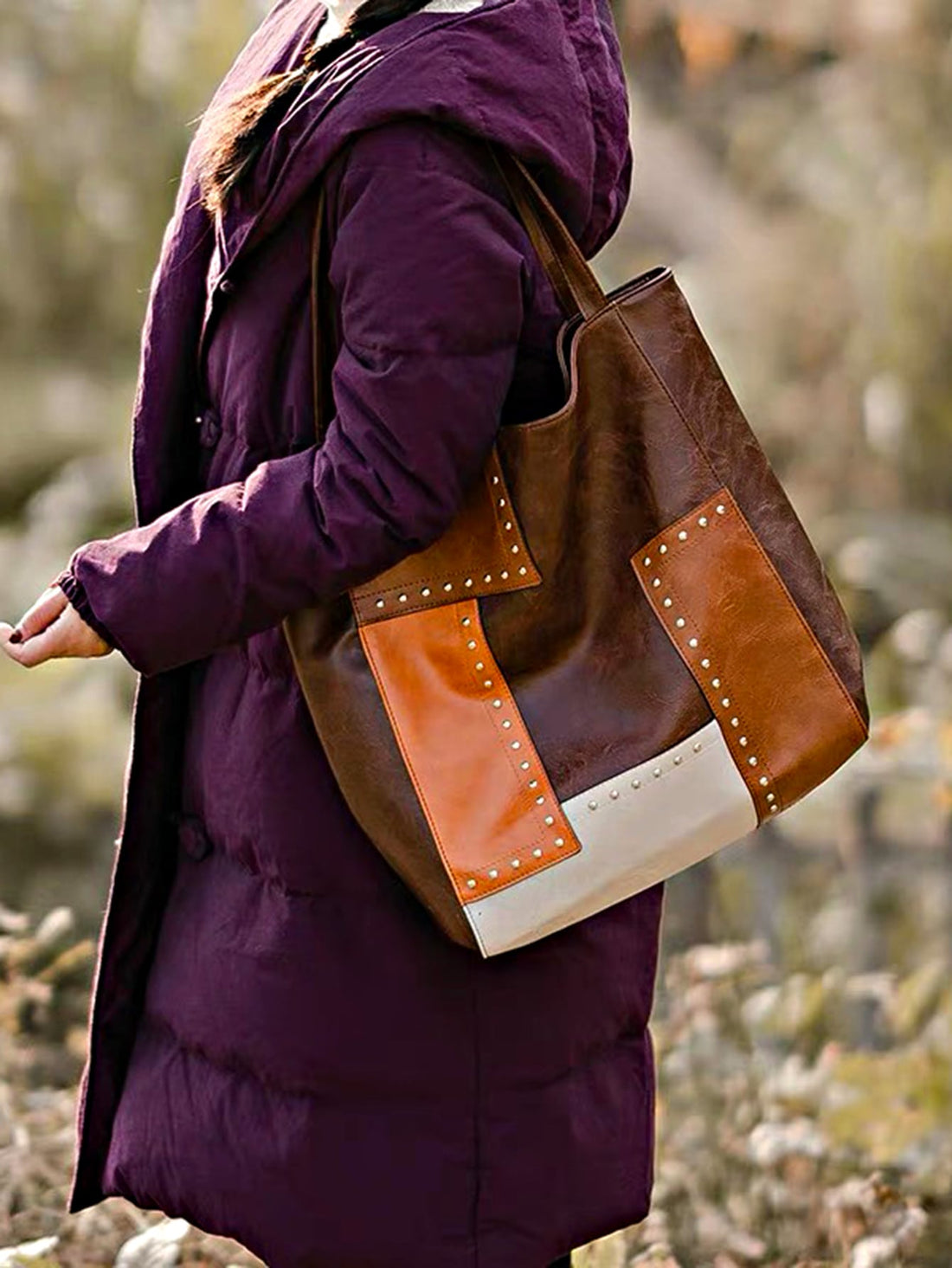 This retro chic patchwork tote is a stylish and versatile accessory that adds a pop of color to any outfit. Made from high-quality materials, this bag is durable and functional, with a spacious interior and comfortable shoulder straps. Perfect for everyday use or a night out.