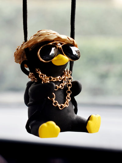 Introducing the Adorable Duck Design Car Hanging Ornament - the perfect addition to any car! This quirky and charming ornament is designed to bring a touch of personality to your ride. With its adorable duck design, it's sure to make your travels more cheerful and lively.