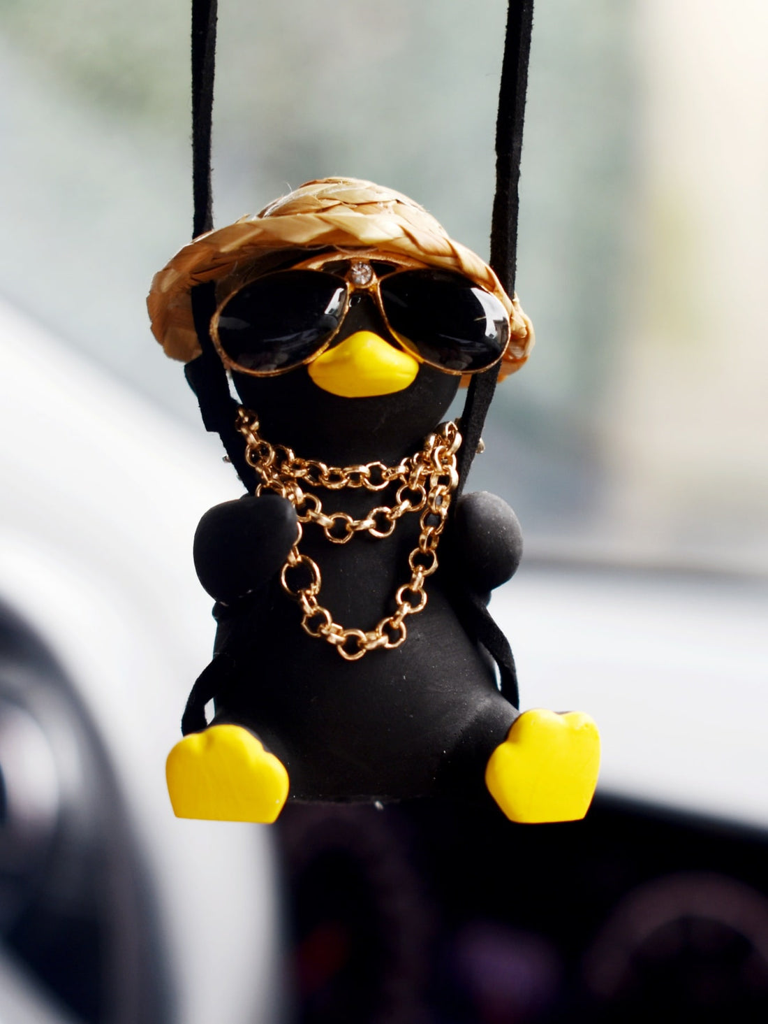 Introducing the Adorable Duck Design Car Hanging Ornament - the perfect addition to any car! This quirky and charming ornament is designed to bring a touch of personality to your ride. With its adorable duck design, it's sure to make your travels more cheerful and lively.