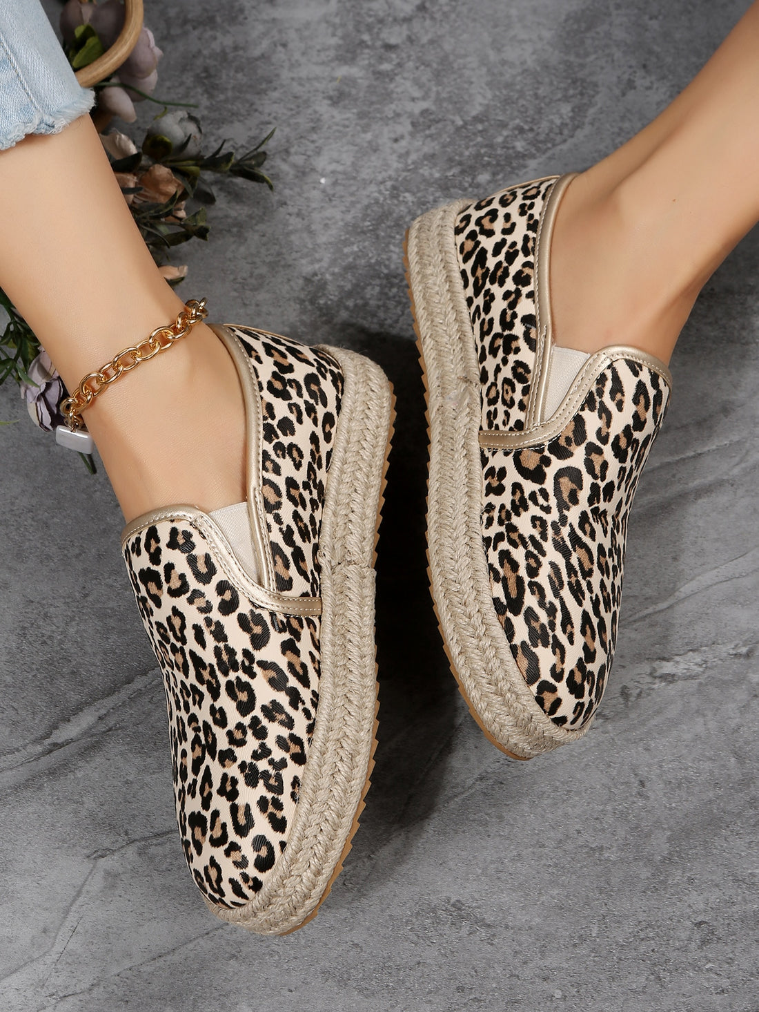 Elevate your vacation vibes with the effortlessly stylish Chic Leopard Print Slip-On Sneakers. Made for the fashion-forward traveler, these slip-on sneakers feature a chic leopard print design that will add a touch of glam to any outfit. Lightweight and comfortable, they are perfect for all-day wear.