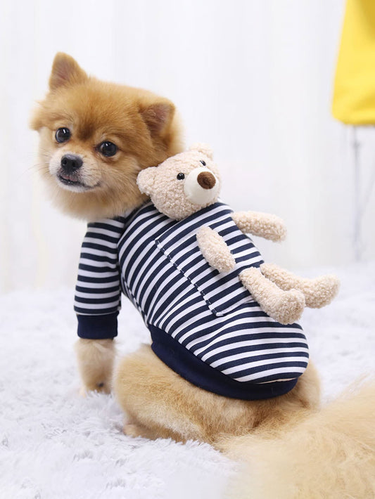 Introducing our Cozy Chic Plaid Cartoon Bear Pet Sweatshirt, designed especially for small to medium pets. Made with soft and warm materials, this sweatshirt will keep your furry friend snug and stylish. Perfect for those chilly days, your pet will love snuggling up in this adorable and comfortable sweatshirt.