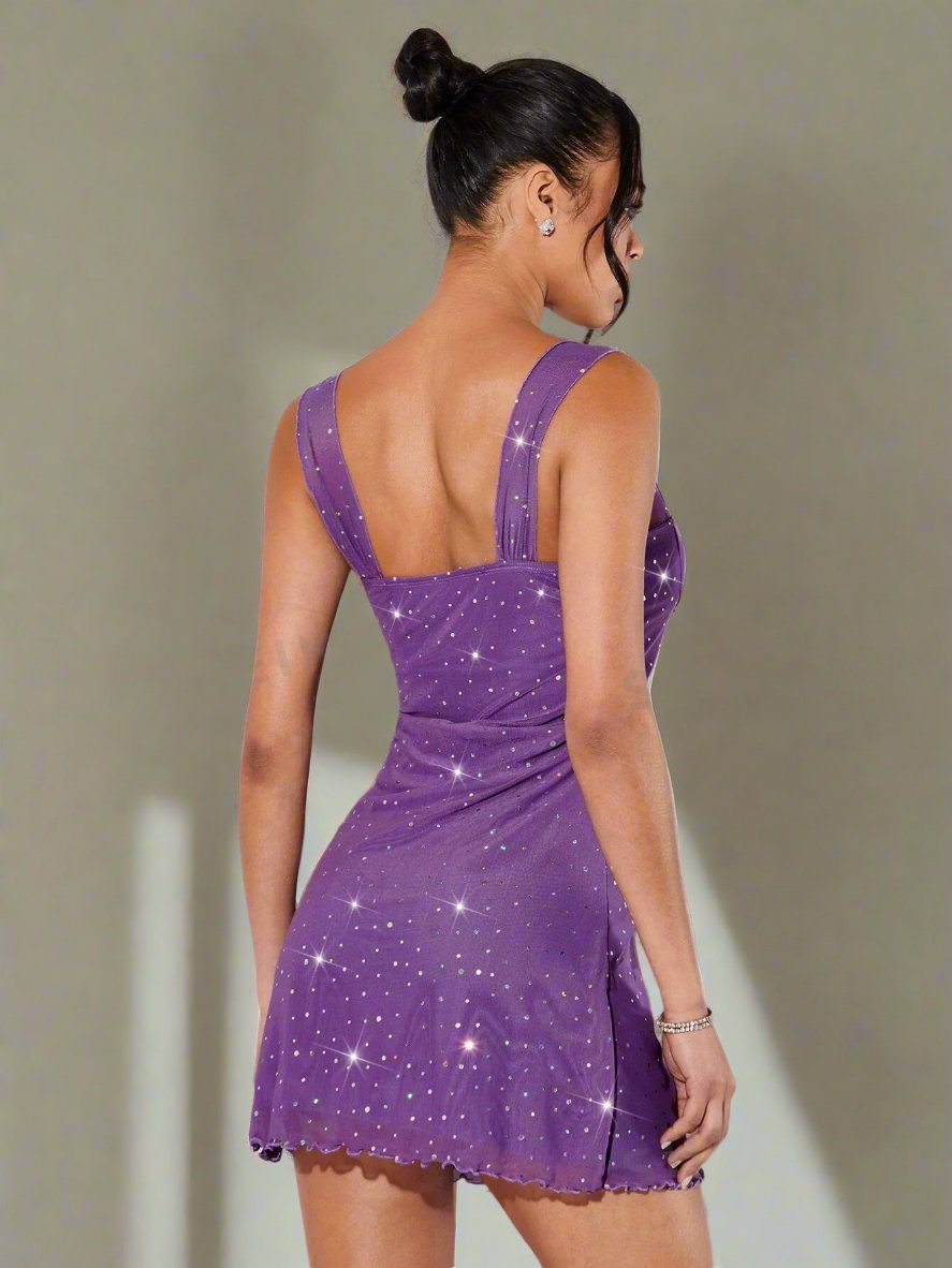 Elevate your style with the Glimmering Goddess: Sequin Lettuce Trim Cami Dress. Featuring sparkling sequins and delicate lettuce trim, this dress adds a touch of glamour to your wardrobe. Perfect for any occasion, it's sure to make you feel like a goddess.