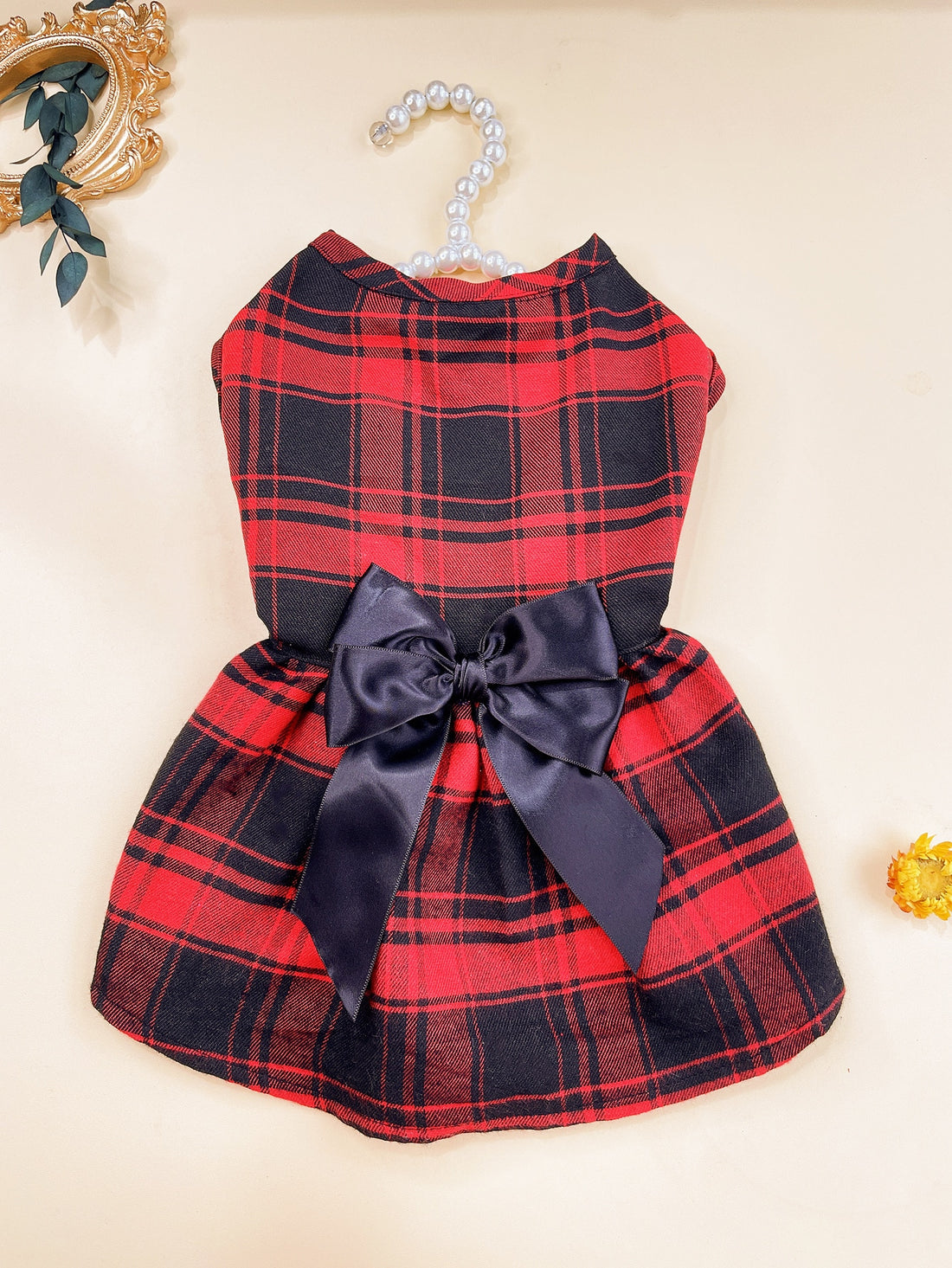 This Chic and Stylish Plaid Print Pet Dress is the perfect way to elevate your pet's style. The plaid print adds a touch of sophistication, while the quality material ensures comfort. Let your furry friend make a fashionable statement with this trendy dress.